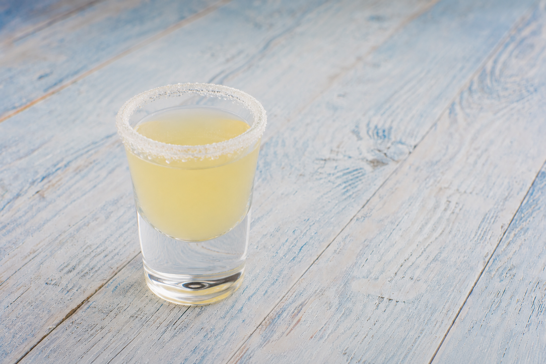 Green Tea Lemon Drop Shot in a sugar-rimmed shot glass
